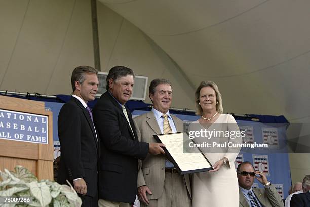 Tom Seaver, Dale Petroskey and Jane Clark of the Hall of Fame present "Ford C. Frick Award" to Denny Matthews during the Baseball Hall of Fame...