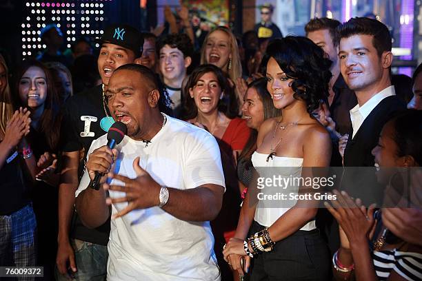 Singer Chris Brown, producer, rapper Timbaland, singer Rihanna and Singer Robin Thicke appear onstage during a special Video Music Awards nominee...