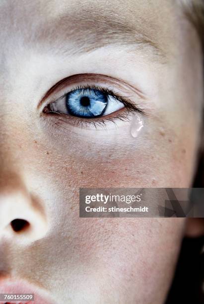 portrait of a boy crying - teardrop foto e immagini stock