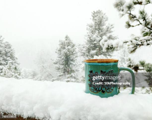 butterfly mug in the snow - wood ledge stock pictures, royalty-free photos & images