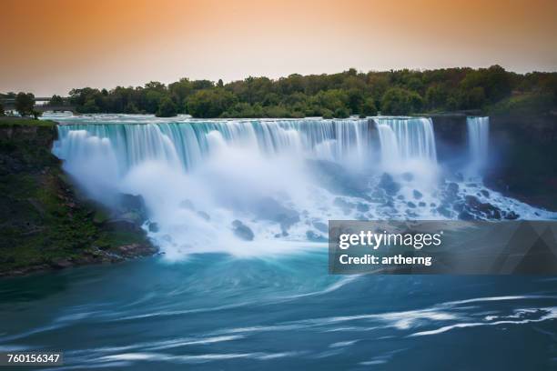 american falls and bridal veil falls at sunrise, niagara falls, new york, america, usa - niagarawatervallen stockfoto's en -beelden