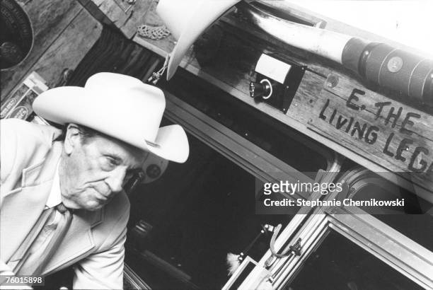 Country musician Ernest Tubb relaxes on his tour bus in circa 1979 in New York, New York.