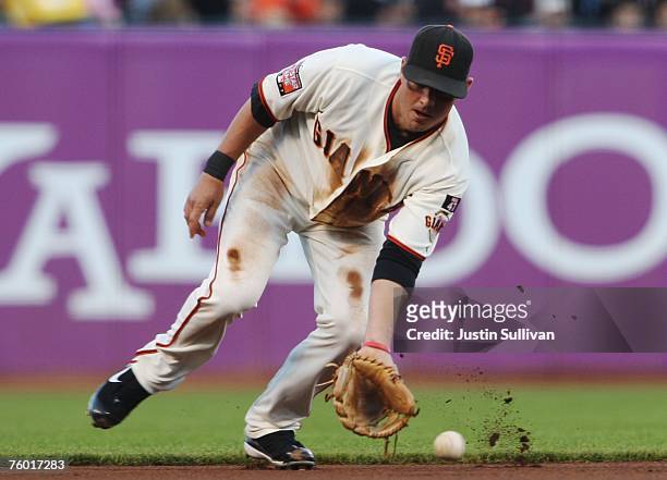 Kevin Frandsen of the San Francisco Giants fields a ground ball during the Major League Baseball game against the Washington Nationals at AT&T Park...