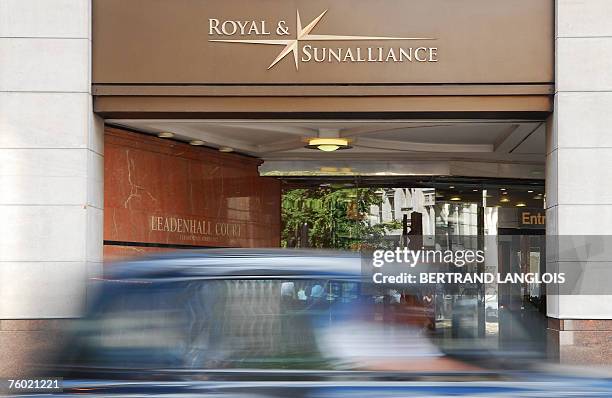 Taxi cruises by the offices of the Royal and Sun Alliance in London, 08 August 2007. British insurer Royal and Sun Alliance said today it planned to...