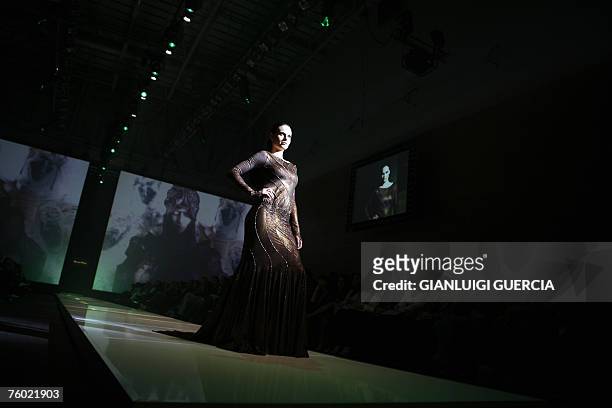 Model shows, 08 August 2007, one of the creation of South African designer David Tlale during the Cape town fashion week in Cape Town. AFP...