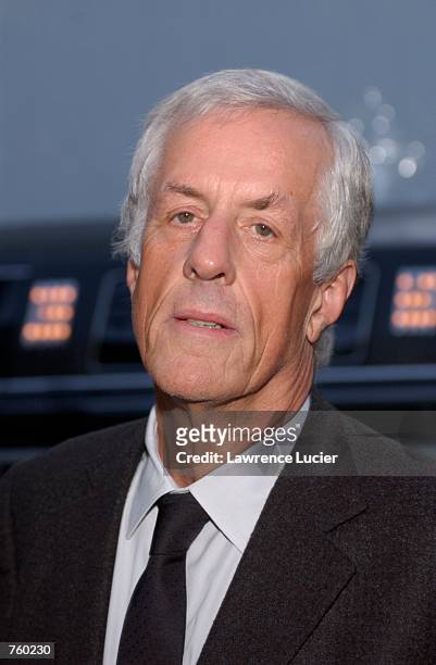 Director Michael Apted arrives at the benefit premiere of Enigma April 11, 2002 in New York City. The benefit supports the International Rescue...