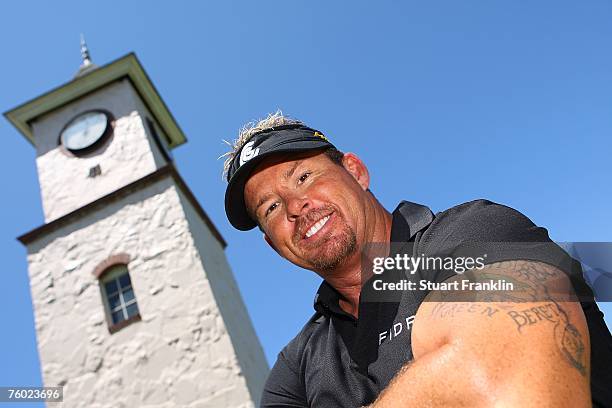 Sports Therapist Jim Weathers poses for a photo next to the clock tower at the practice range the day before the first round of the 89th PGA...