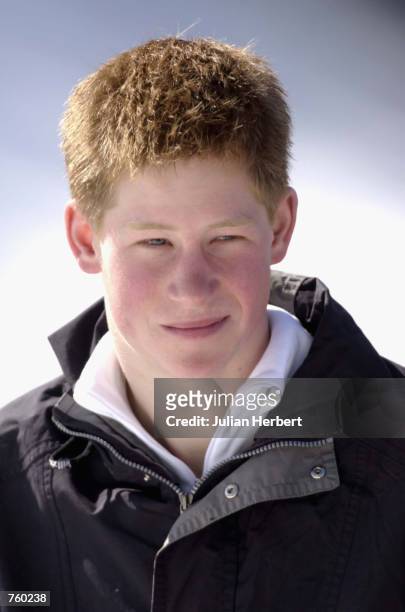 Britain's Prince Harry attends a photocall during his annual skiing holiday in the Swiss alps with his father Prince Charles and his brother Prince...