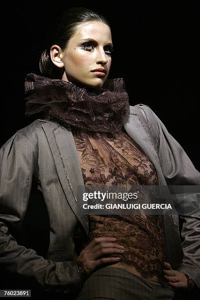 Model shows, 08 August 2007, one of the creation of South African designer David Tlale during the Cape town fashion week in Cape Town. AFP...