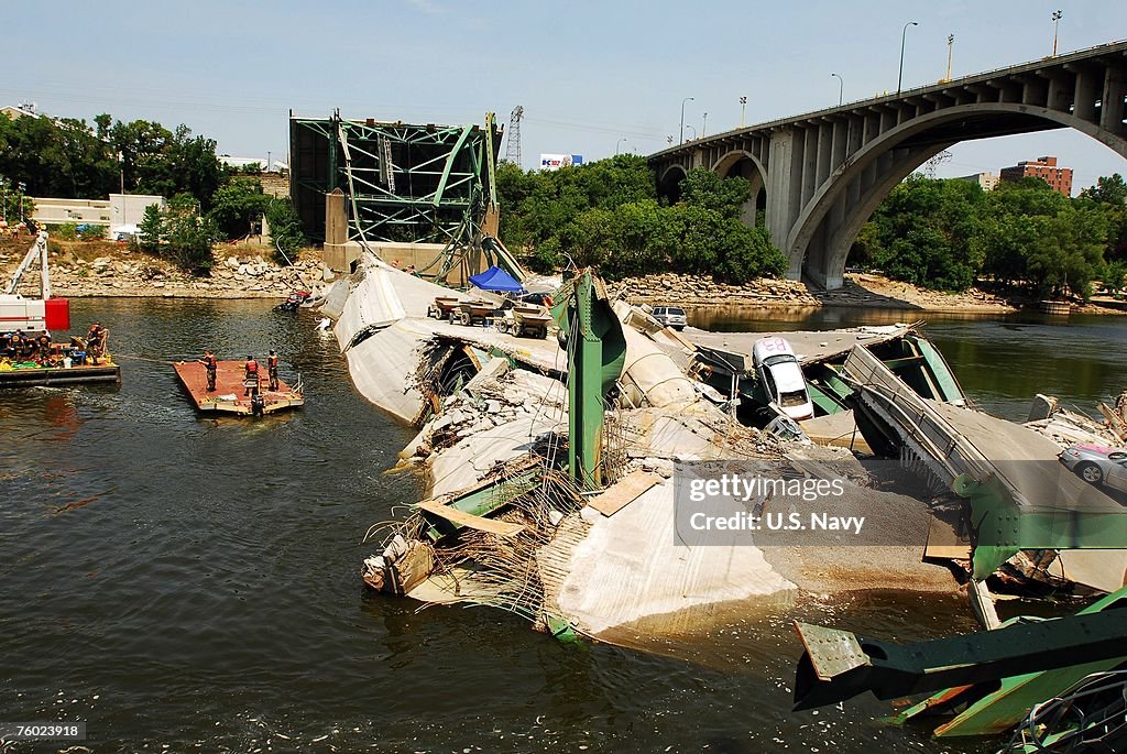 Navy Divers Investigate Site Of Bridge Collapse