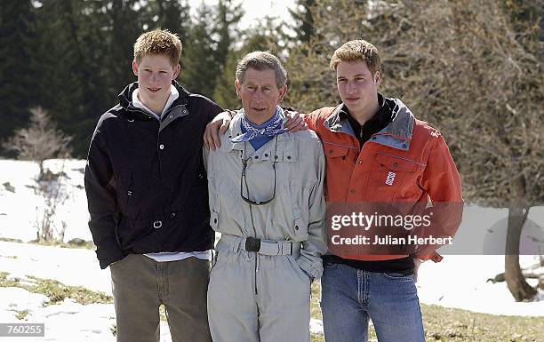Prince Charles and his sons William and Harry appear at a photocall March 29, 2002 in the Swiss village of Klosters at the start of his annual sking...
