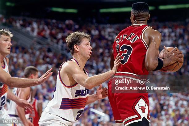 Danny Ainge of the Phoenix Suns defends Scottie Pippen of the Chicago Bulls in Game Two of the 1993 NBA Finals on June 11, 1993 at the America West...