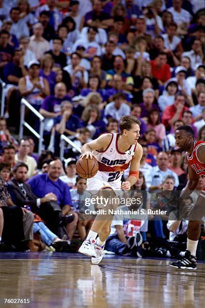 Danny Ainge of the Phoenix Suns looks over the defense against the Chicago Bulls in Game Two of the 1993 NBA Finals on June 11, 1993 at the America...