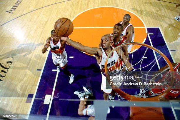 Charles Barkley of the Phoenix Suns attempts a layup against the Chicago Bulls in Game Two of the 1993 NBA Finals on June 11, 1993 at the America...
