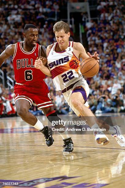 Danny Ainge of the Phoenix Suns drives to the basket against the Chicago Bulls in Game One of the 1993 NBA Finals on June 9, 1993 at the America West...