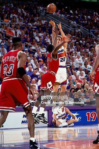 Danny Ainge of the Phoenix Suns attempts a shot against the Chicago Bulls in Game Six of the 1993 NBA Finals on June 20, 1993 at th America West...