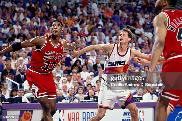 Danny Ainge of the Phoenix Suns battles for position against Scottie Pippen of the Chicago Bulls in Game Six of the 1993 NBA Finals on June 20, 1993...