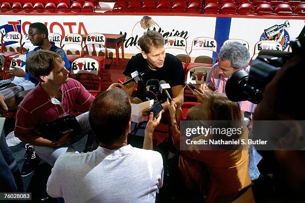 Danny Ainge of the Phoenix Suns talks with the media before Game Four of the 1993 NBA Finals on June 16, 1993 at the Chicago Stadium in Chicago,...