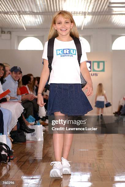 Model Jamie Lynn Spears participates in the Fall 2002 Kids R Us fashion runway show April 11, 2002 in New York City. Spears wears a KRU logo tee and...