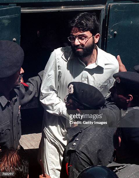 Ahmed Omar Saeed Sheikh, the alleged mastermind behind Wall Street Journal reporter Daniel Pearl's abduction, arrives March 29, 2002 at the...