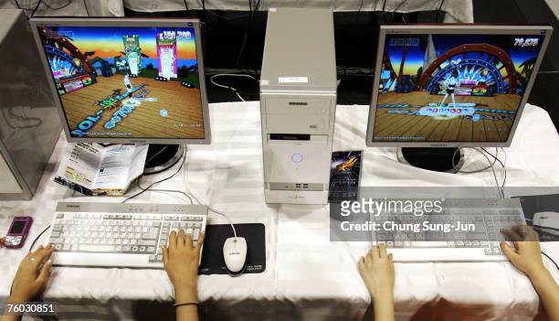 Contestants play computer games during the "E-Stars Seoul 2007" game festival hosted by the Seoul Metropolitan Government at Seoul Olympic Park on...