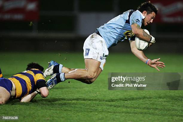 Rene Ranger of Northland is tripped by the Bay of Plenty defence during the Air New Zealand Cup match between Bay of Plenty and Northland at Rotorua...