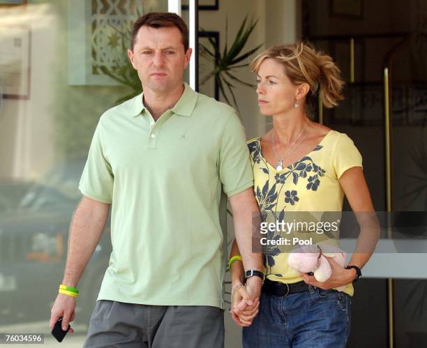 Gerry and Kate McCann, parents of missing Madeleine McCann, leave a hotel on route to an interview with television crews on August 9, 2007 in Praia...