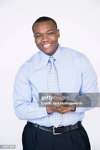 young business man, upper half, portrait - half shaved hair stockfoto's en -beelden