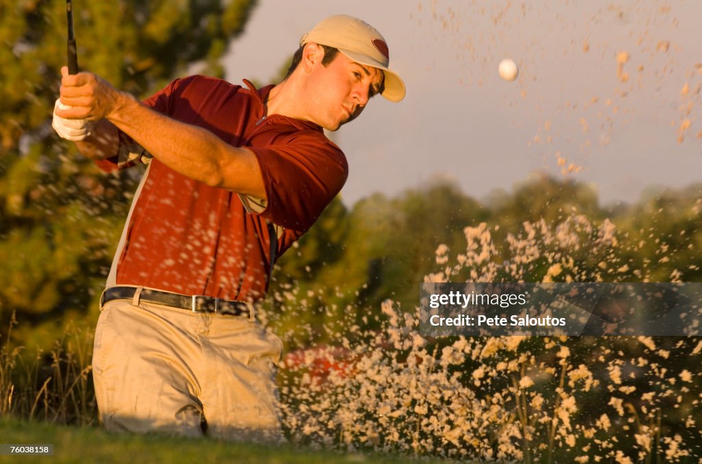 Man playing golf