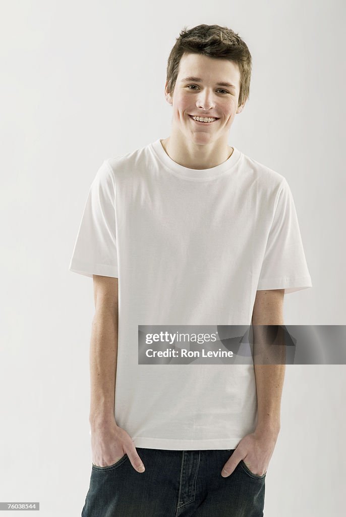 Teenage boy (14-15), smiling, portrait