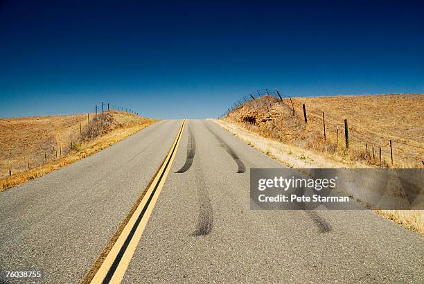usa, california, skid marks on road leading to napa valley - skid marks accident stock pictures, royalty-free photos & images
