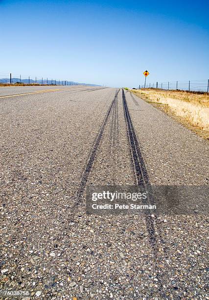 usa, california, skid marks on road leading to napa valley - skid marks accident stock pictures, royalty-free photos & images