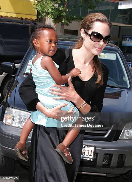 Angelina Jolie and Zahara visit Timeless Toys in Chicago on August 9, 2007.