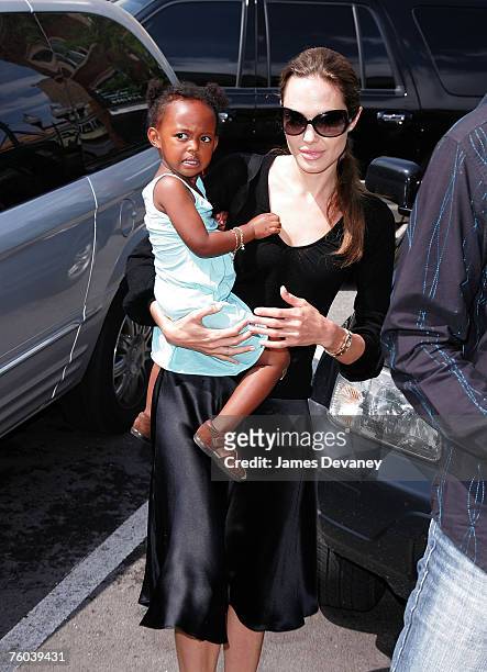Angelina Jolie and Zahara visit Timeless Toys in Chicago on August 9, 2007.