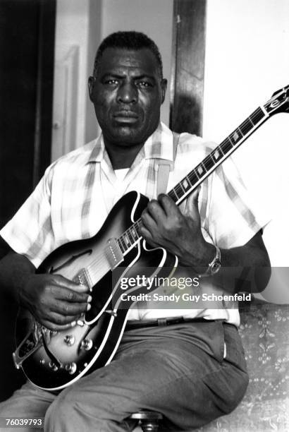 Blues musician Howlin' Wolf poses for a portrait in a hotel room in July 1968 in San Francisco, California.