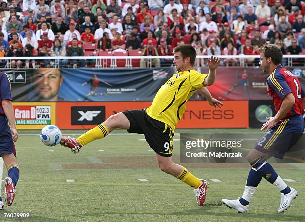 Real Salt Lake vs. Columbus Crew-April 14, 2007: Jason Garey of the Columbus Crew traps the ball in front of Daniel Torres of the Real Salt Lake on...