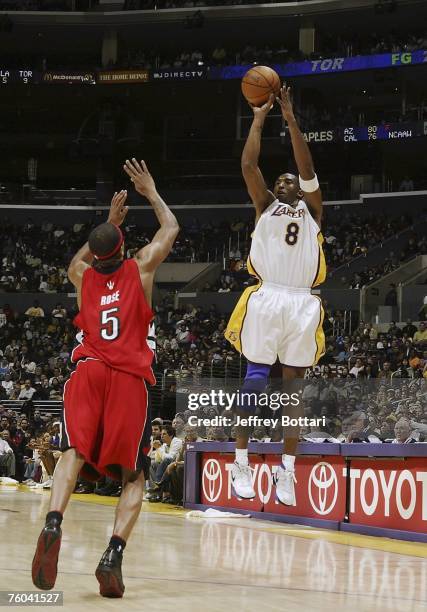 Kobe Bryant of the Los Angeles Lakers shoots a jump shot over Jalen Rose of the Toronto Raptors during his 81 point explosion on January 22, 2006 at...