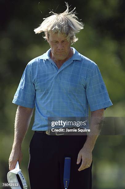 Stuart Appleby of Australia seeks relief from the heat during the first round of the 89th PGA Championship at the Southern Hills Country Club on...