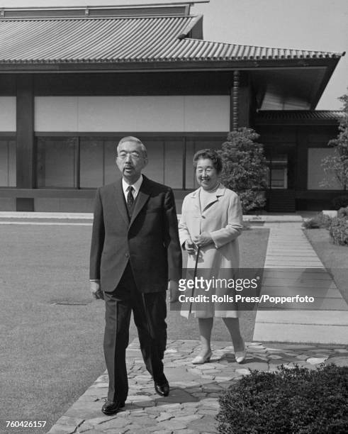 Hirohito, Emperor Showa of Japan pictured with his wife Empress Nagako pictured together in the garden of their residence in Japan in October 1971.
