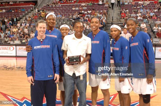 Angelina Williams of the Seattle Storm receives her Championship ring from last season when she was with the the Detroit Shock on August 9, 2007 at...