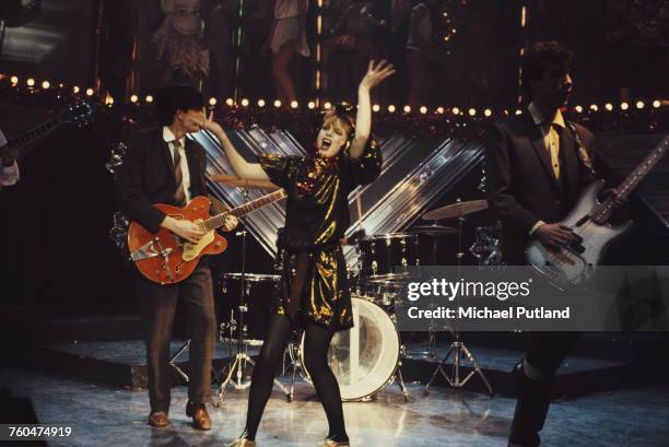 Scottish new wave group Altered Images performing 'Happy Birthday' on the Christmas Day edition of the BBC TV music show 'Top Of The Pops', which was...