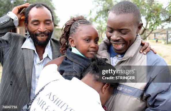 David Chegue David Chege is embraced by relatives outside the law courts in the ...