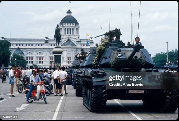 Tanks loyal to the Thai government take up position in front of the Thai parliament building in Bangkok during Thailand's 18th coup since 1932, 9th...