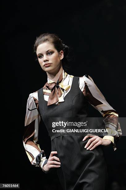 Model shows, 10 August 2007, one of the creations of the Carducci collection during the third day of the Cape Town fashion week in Cape Town.Now in...