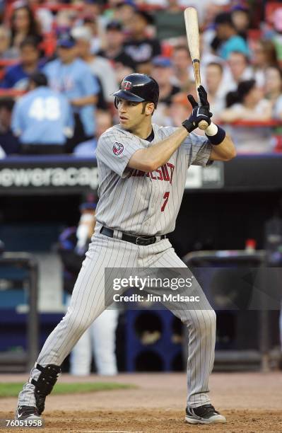 Joe Mauer of the Minnesota Twins bats against the New York Mets during their interleague game at Shea Stadium June 18, 2007 in the Flushing...