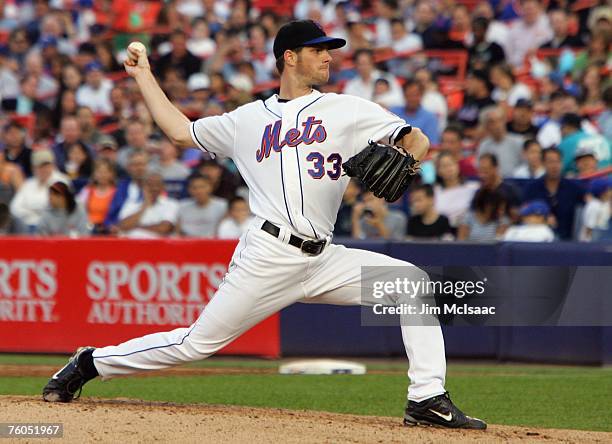 John Maine of the New York Mets pitches against the Minnesota Twins during their interleague game at Shea Stadium June 18, 2007 in the Flushing...