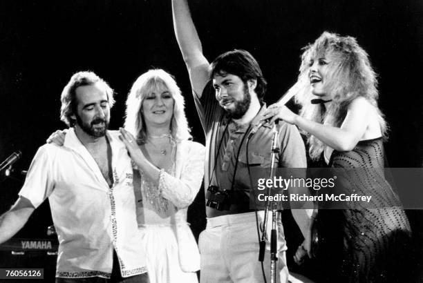 John McVie, Christine McVie, organizer and executive Steve Wozniak and Stevie Nicks of the rock group "Fleetwood Mac" perform onstage at the US...