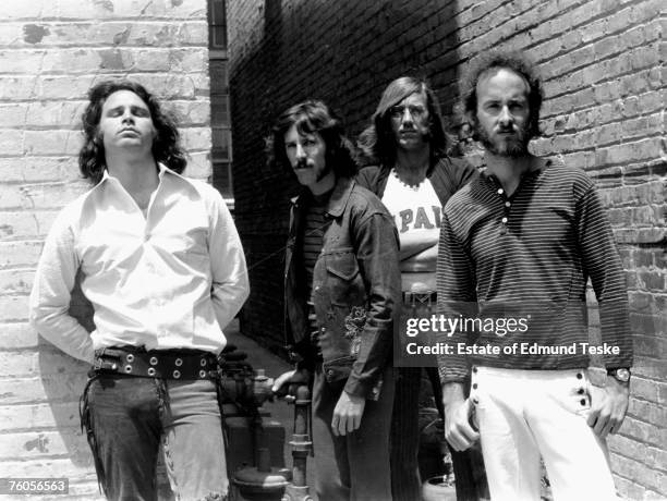 The Doors L-R Jim Morrison, John Densmore, Ray Manzarek and Robby Krieger pose for a portrait circa 1968 in Hollywood, California.