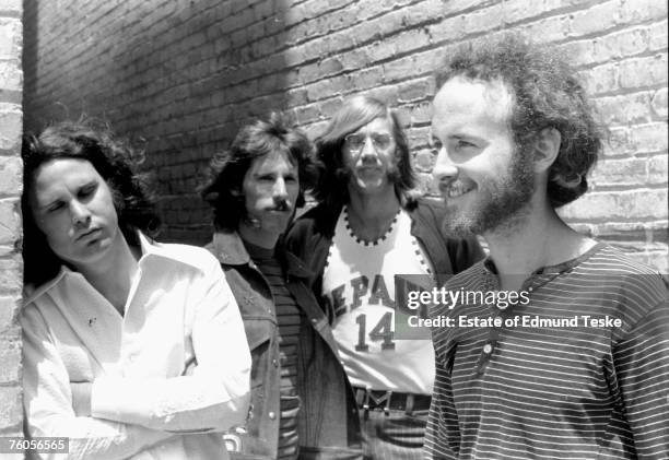 The Doors L-R Jim Morrison, John Densmore, Ray Manzarek and Robby Krieger pose for a portrait circa 1968 in Hollywood, California.