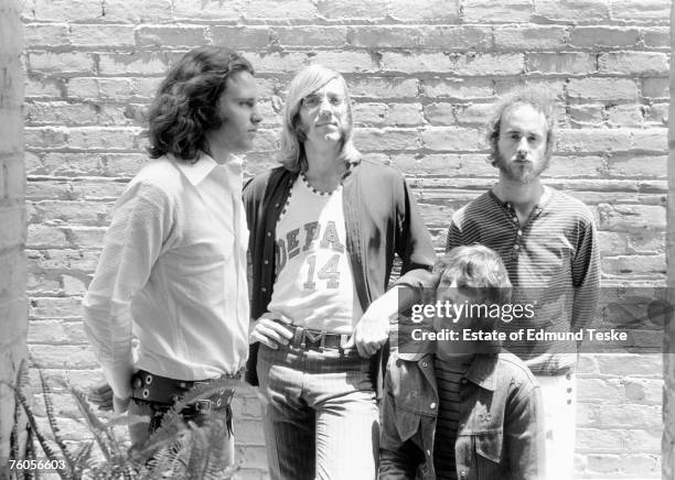 The Doors L-R Jim Morrison, Ray Manzarek, John Densmore and Robby Krieger pose for a portrait circa 1968 in Hollywood, California.